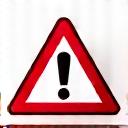 Icon of a warning sign